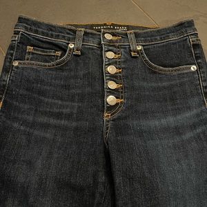 Veronica Beard boot crop jeans. Cute ribbon and snap detail. Size 27